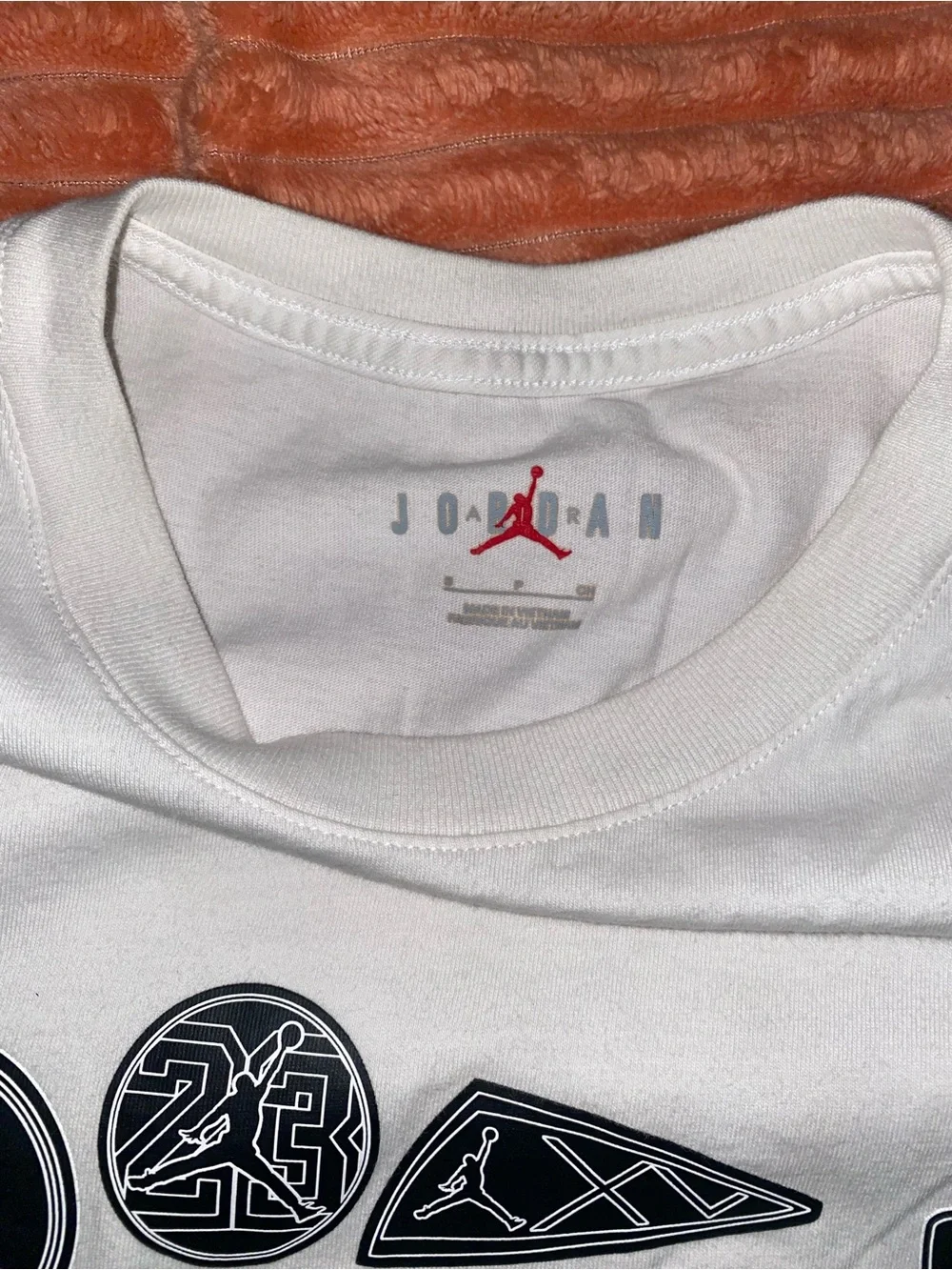 Jordan White Shorty Sleeve Tee with Black Graphic Logos like new